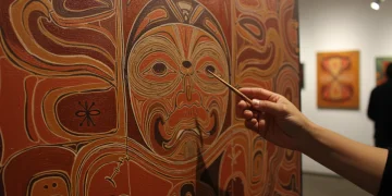 Vibrant contemporary Indigenous painting with traditional motifs and modern expression