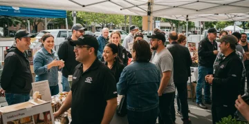 Community members and local business owners at a vibrant local market, symbolizing strong local brand building.